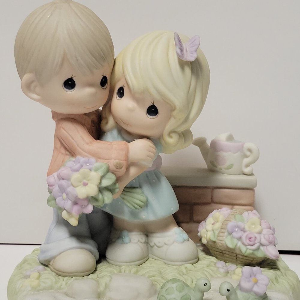 Precious Moments Figurine "Embraced In Your Love"